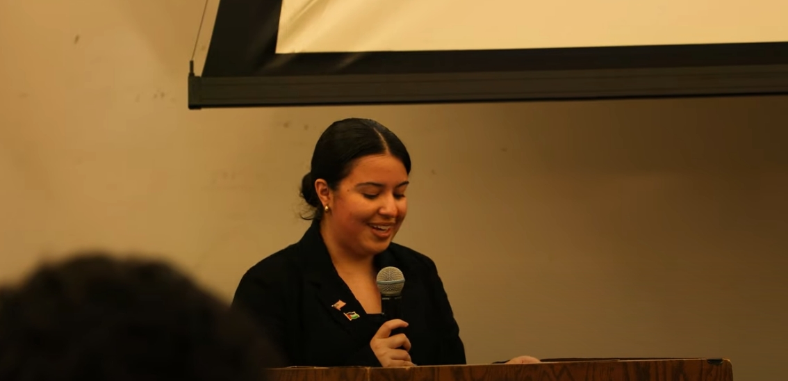 political science student presenting at the public policy forum