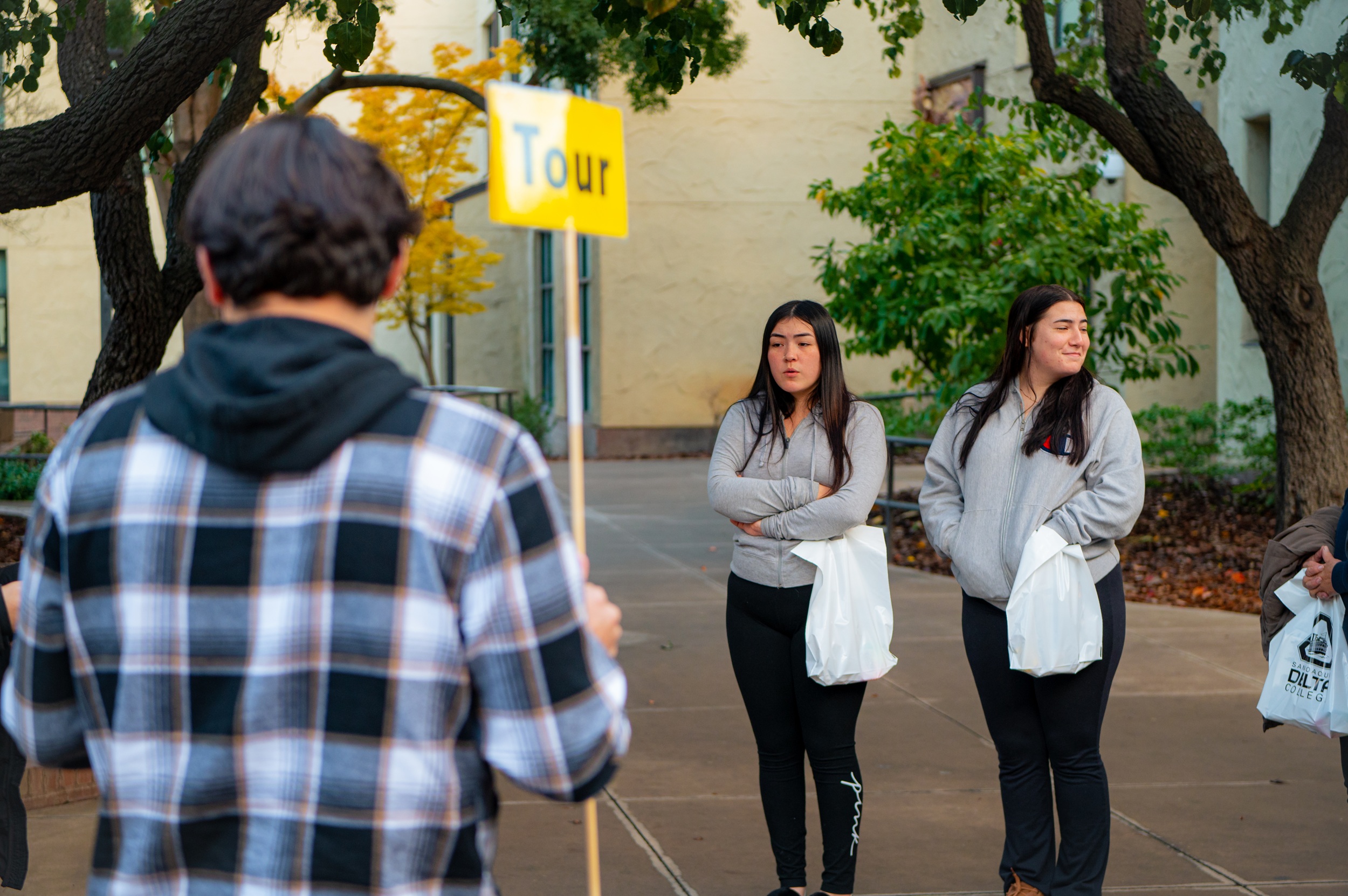 Prospective students listen to their tour guide