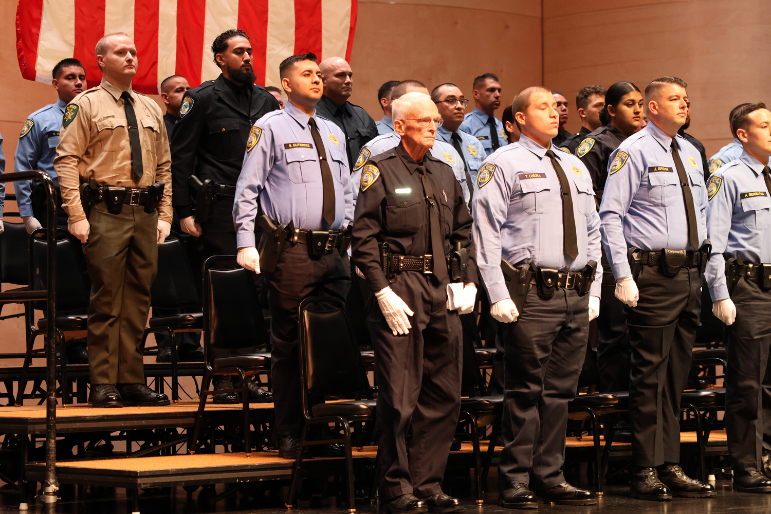 Photo of cadet John Myers standing at attention with other cadets