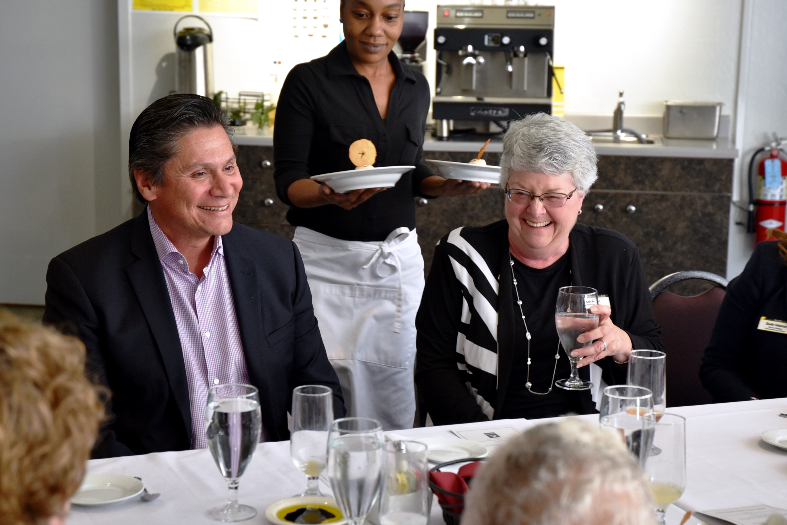 Chancellor Eloy Oakley shares a laugh with San Joaquin Delta College Superintendent/President Kathy Hart.