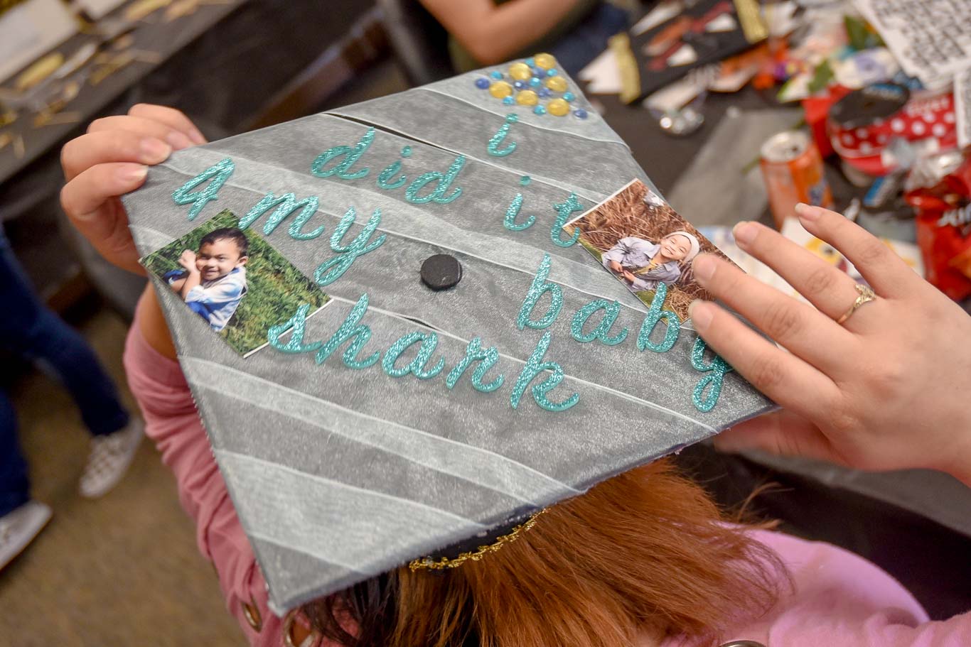 Sesilie Miranda's commencement cap honors her son Haven, who is a big "Baby Shark" fan. Sesilie will graduate from San Joaquin Delta College with an accounting degree.