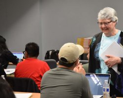 Delta College Superintendent/President Kathy Hart visits with students during one of seven workshops that aimed to instill them with leadership skills. The workshops gave students a chance to learn from and interact with top College leaders.