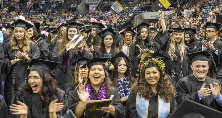 Delta College graduates celebrating
