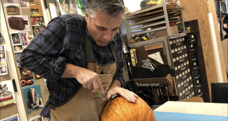 San Joaquin Delta College art professor Gary Carlos shows how to carve the perfect pumpkin. This pumpkin was auctioned off with the money going to student scholarships. San Joaquin Delta College art professor Gary Carlos shows how to carve the perfect pumpkin. This pumpkin was auctioned off with the money going to student scholarships.