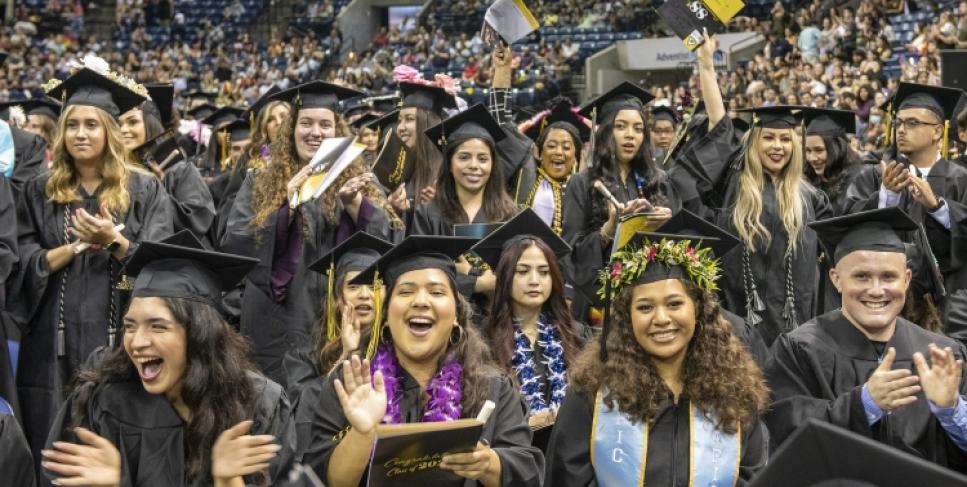 Delta College graduates celebrating