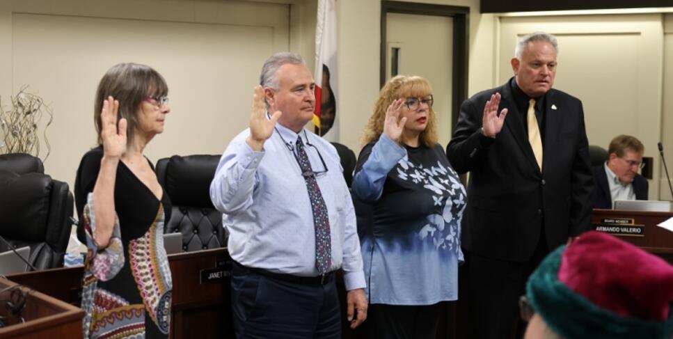 Photo of Delta College trustees being sworn in