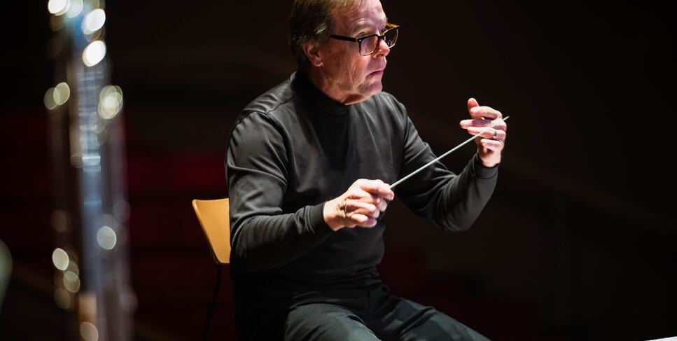 Photo of the band director at a concert