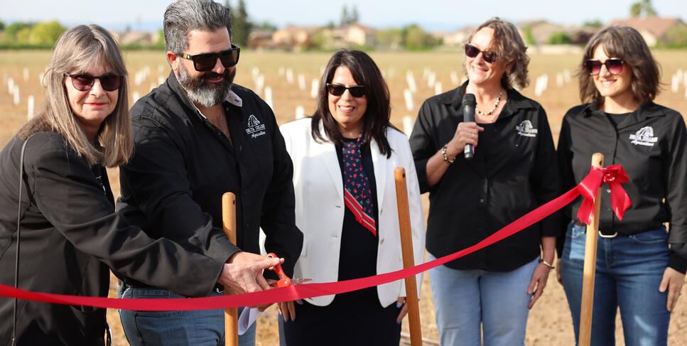 Photo of ribbon cutting at new cherry orchard