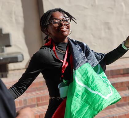 Photo of a Delta College student dancing in the Quad