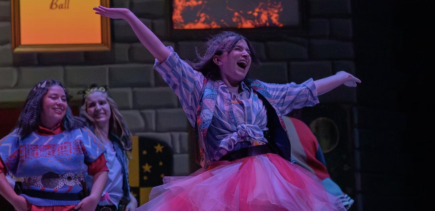 Student Performing on Stage