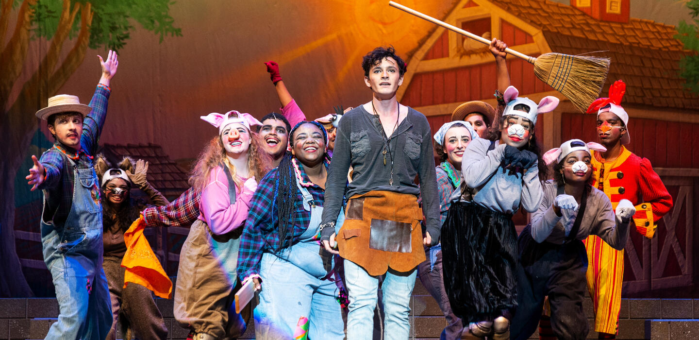 Group of Delta students performing on stage during a drama play