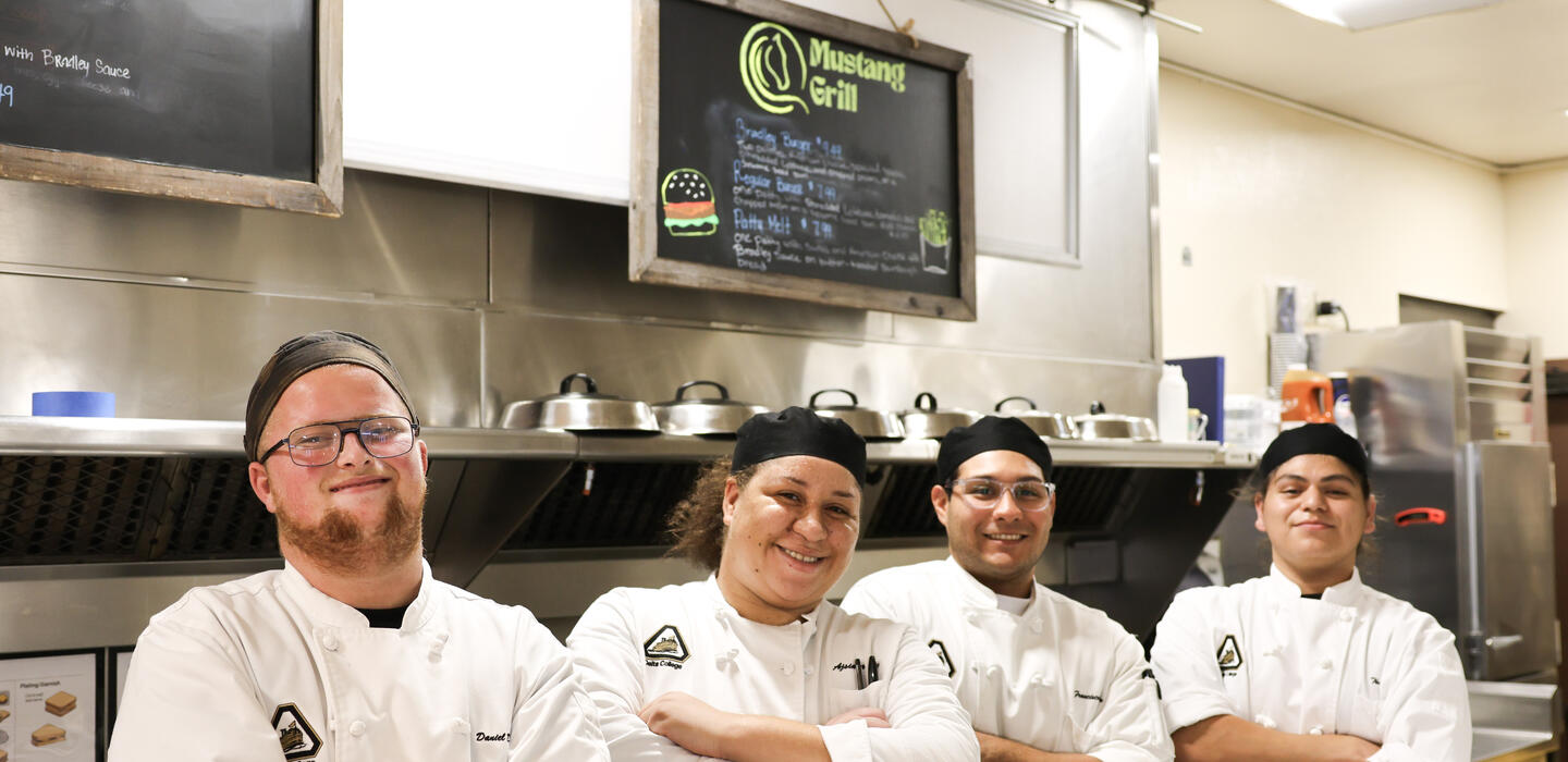 Students working at Delta Mustang Grill