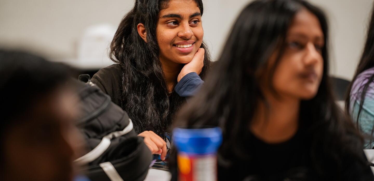 Photo of a student smiling during her dual enrollment course at Mountain House