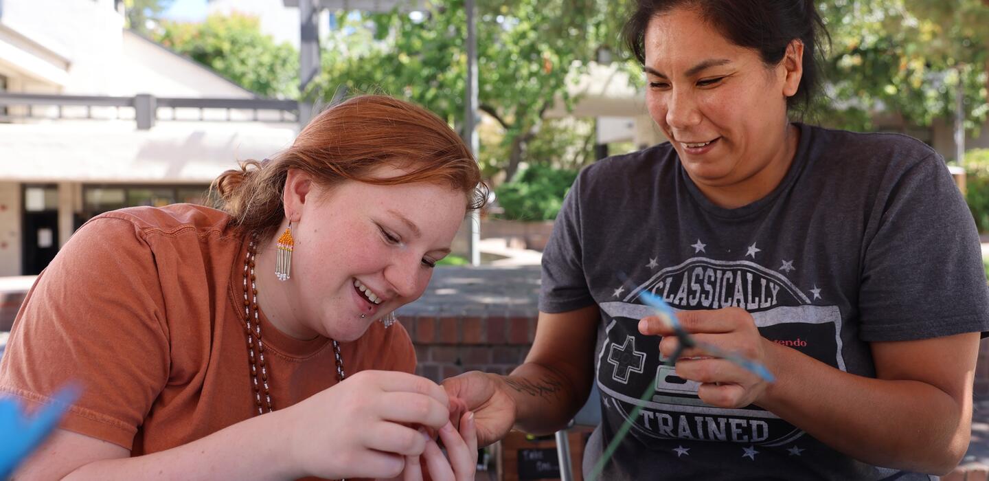 Photo of two students who belong to the Talking Spirit club