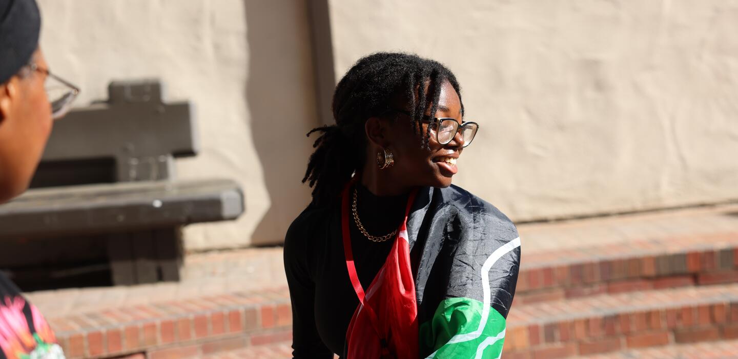 Student dancing and smiling
