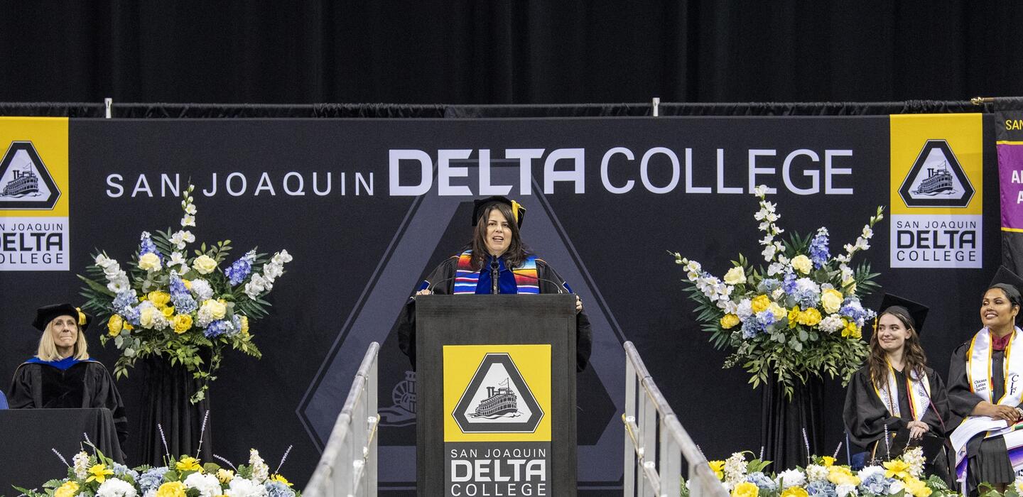 Photo of Superintendent/President Aguilera Lawrenson speaking at Commencement