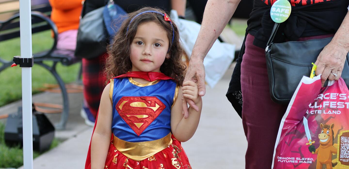 A young girl poses for a photo at Fierce's Fall Fest