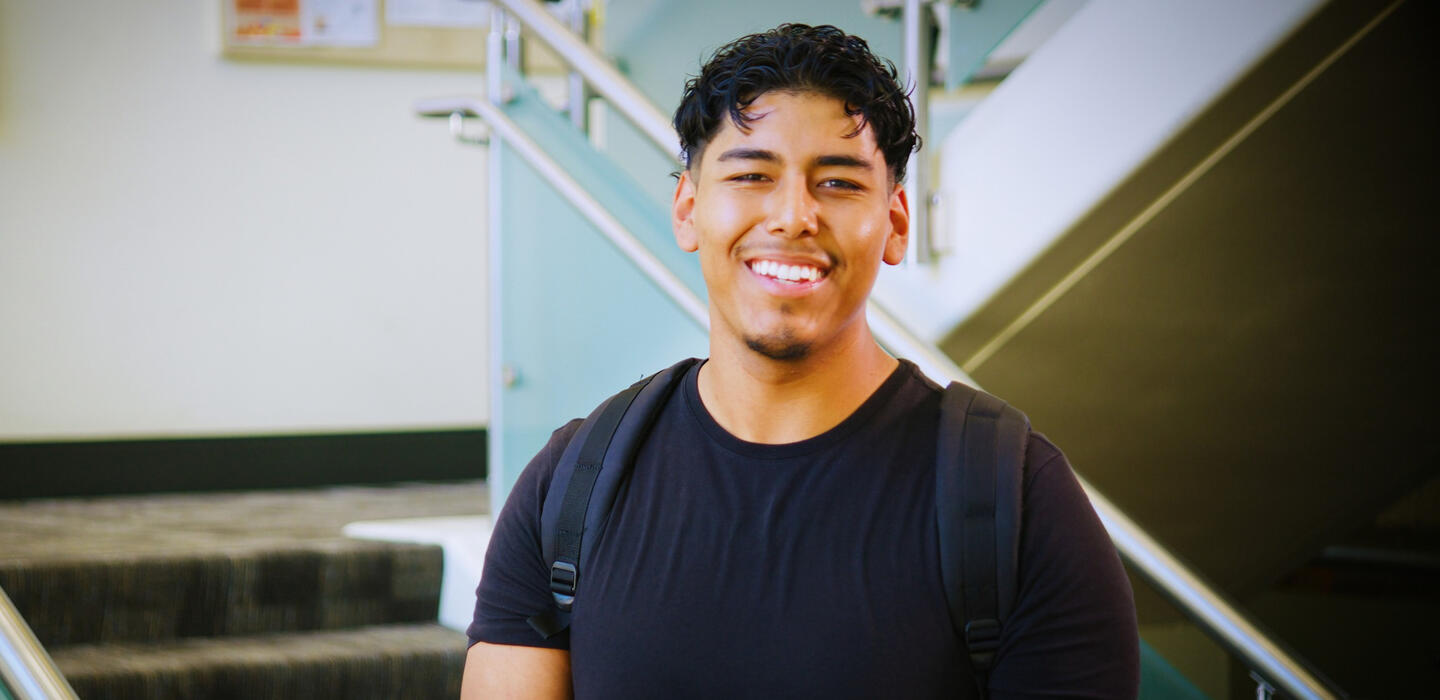 Photo of a student in the library