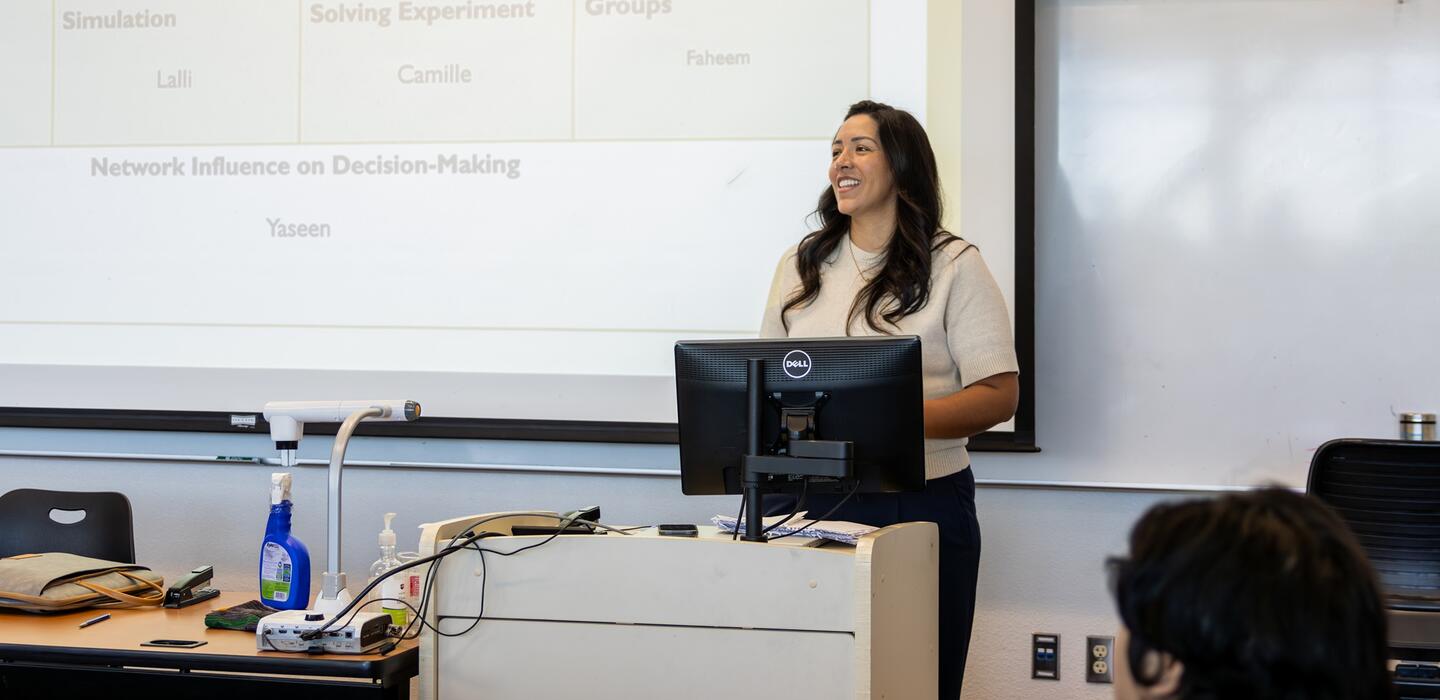 Photo of a sociology instructor lecturing in class