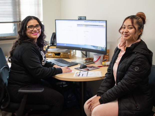 two students working on the computer