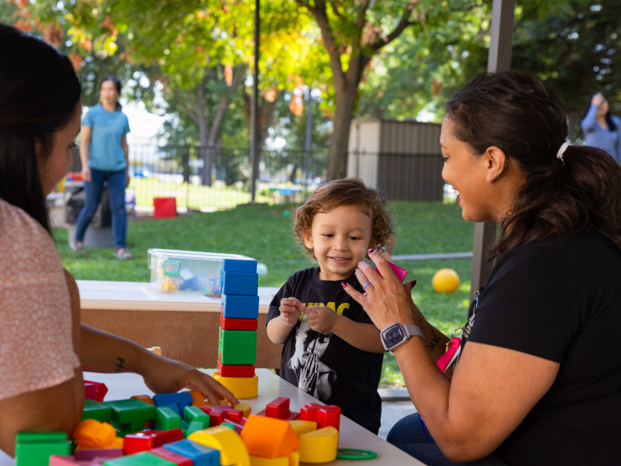 children playing with the tutor