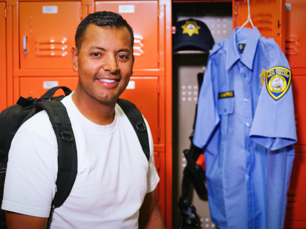 student next to the lockers