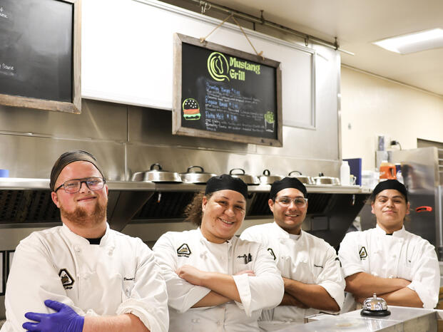 Students working at Delta Mustang Grill