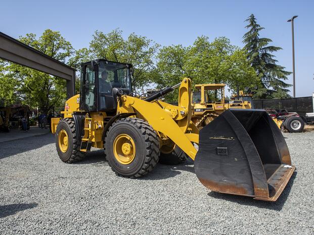 A student operates a Caterpillar machine at Delta College