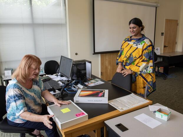 Student picking up Loaner Laptop