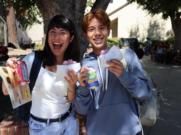 Two students smile in the Delta College quad