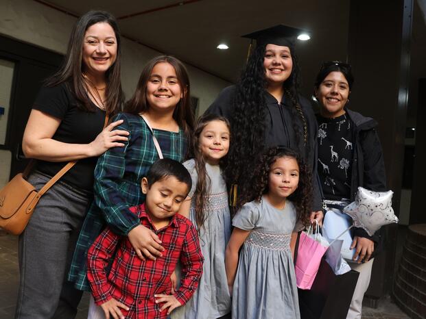 A family celebrates graduation from Delta College