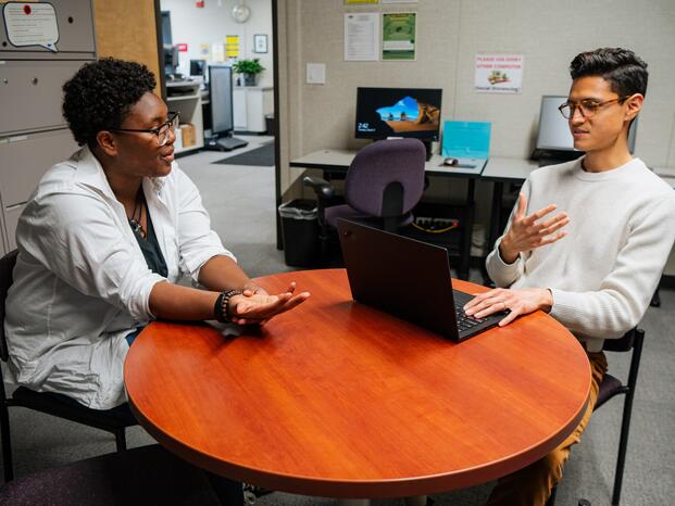 Financial Aid Staff assisting student 