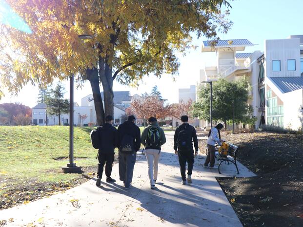 Student veterans walk across the Delta campus