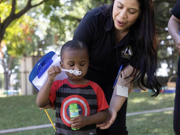 Teacher and Student in school yard