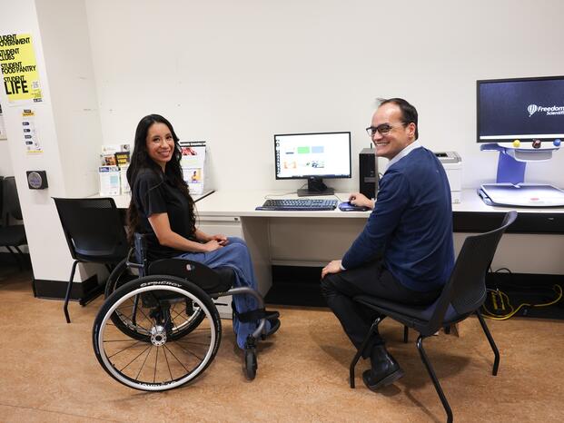 DSPS faculty and staff pose for a photo in the office lobby