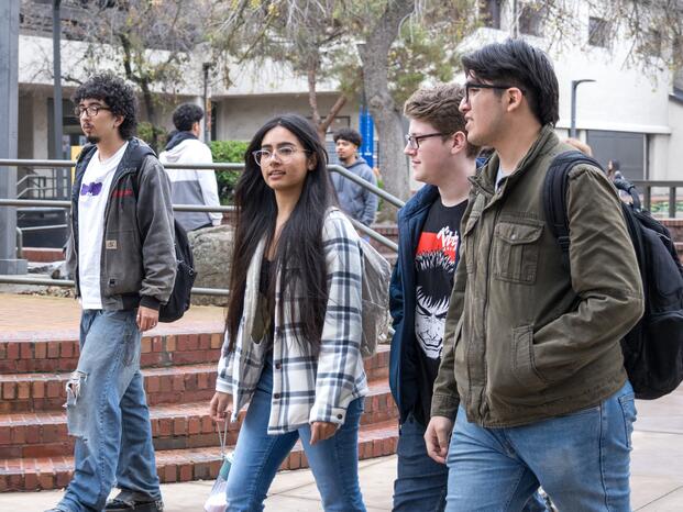Photo of students walking through campus