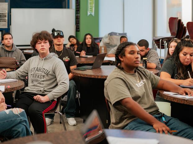 Students pay attention to their professor during a nutrition class
