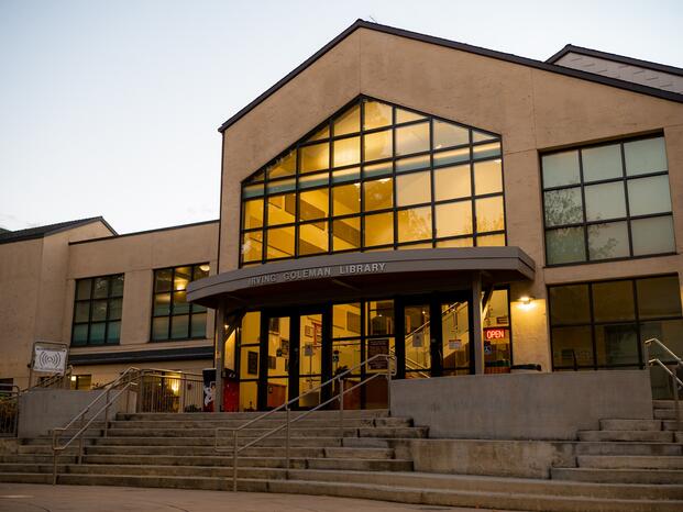 Sunset reflects off the windows of  Goleman Library