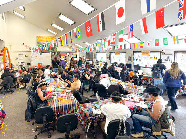 Photo of students gathering for Dia de los Muertos at the Dreamers Success Center