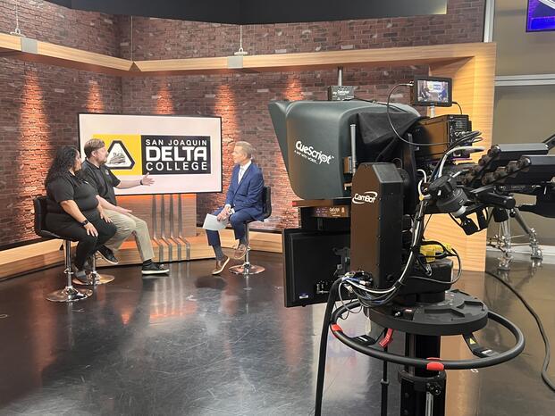 Delta employees participate in a television interview