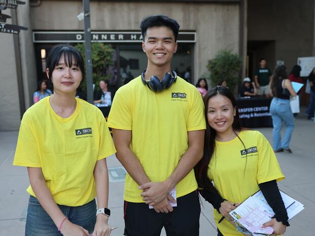 Photo of transfer services students helping at College Night