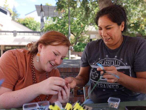 Photo of two students who belong to the Talking Spirit club