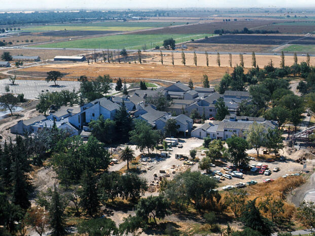 Photo of Delta's campus when it was bordered by farmland