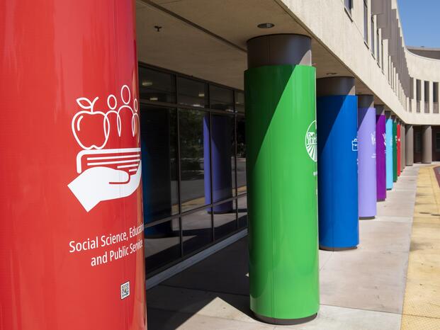 Photo of poles in front of DeRicco Building