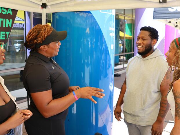 Delta College speaker engaging with a group of students at a Delta campus event