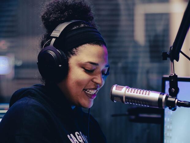 Photo of a student broadcasting on KWDC