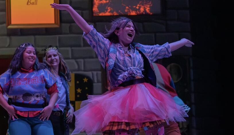 Student Performing on Stage