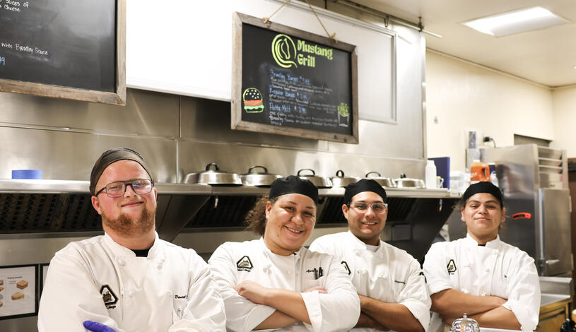 Students working at Delta Mustang Grill