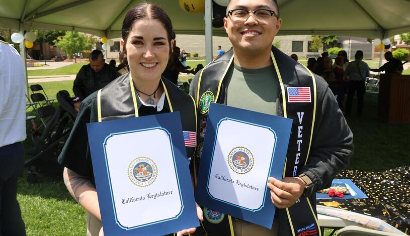 Two student veterans celebrate their graduation at Delta College