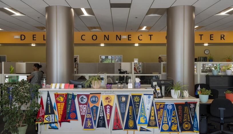 Bright college pennants at the Delta Connect Center